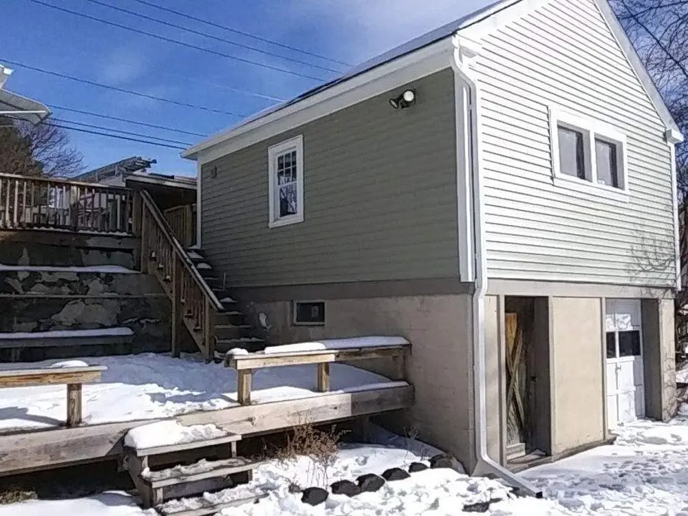 white residential rain gutters