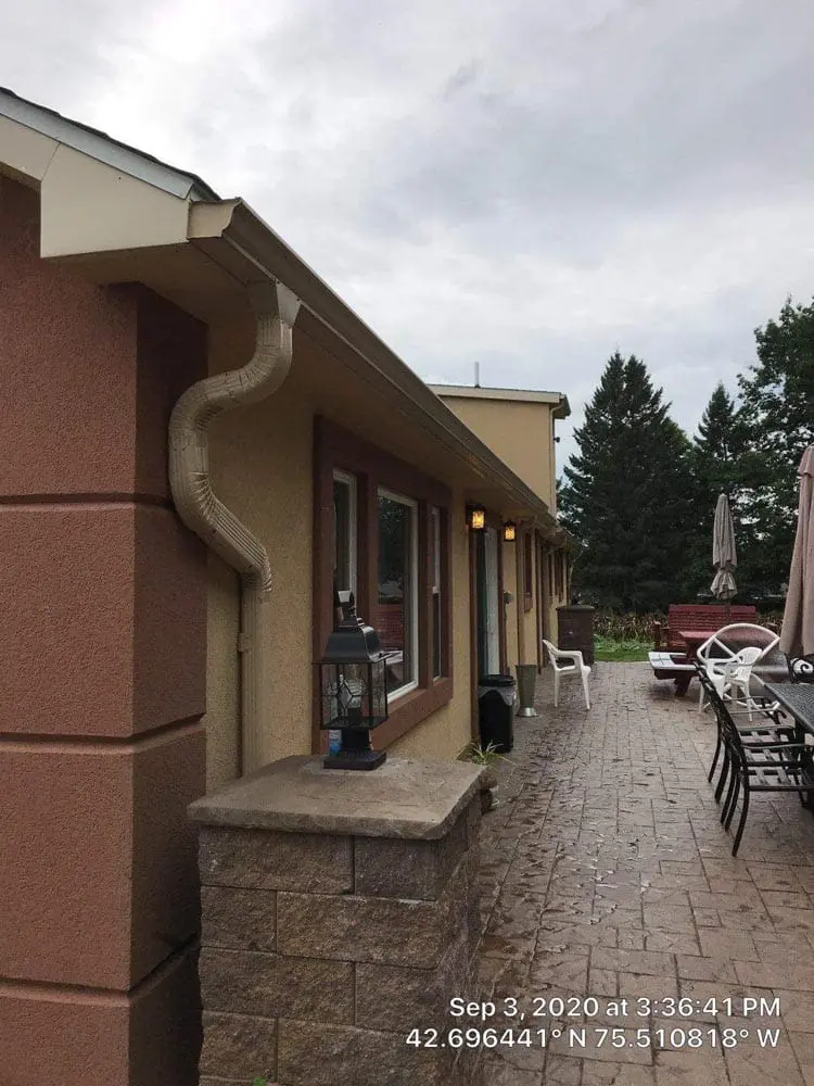 Beige rain gutters - Gutter Experts