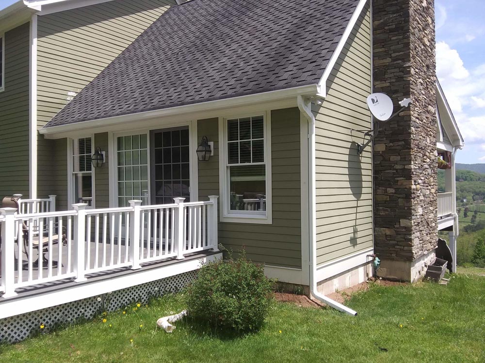 White on Grey Residential home Rain Gutters - Gutter Experts